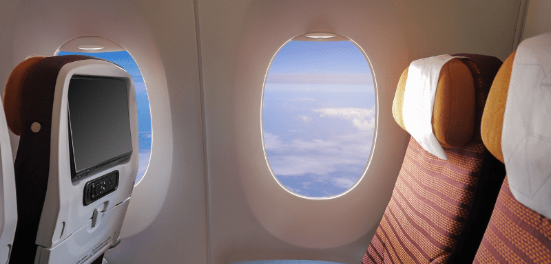 View of clouds through the airplane window.