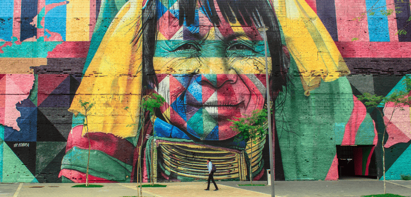 Street wall with a painting by Kobra artist.